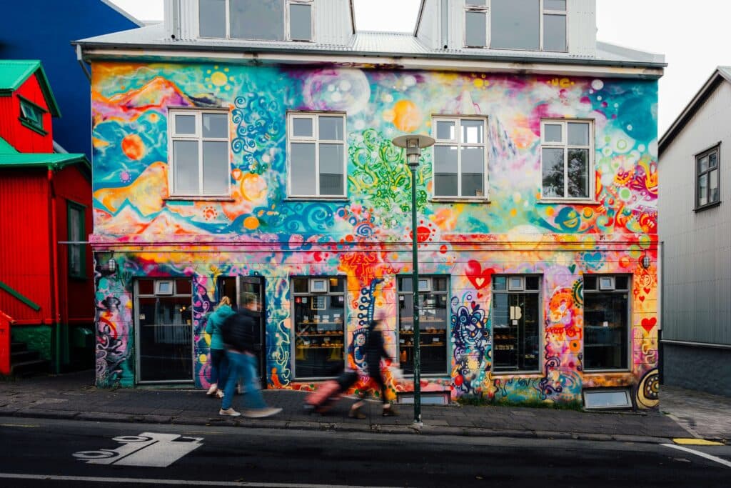Busy retail frontage with pedestrians where overnight repainting reduces disruption.